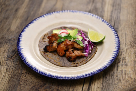 "Tacos al pastor" made with homemade blue tortillas. Mexican foodの写真素材