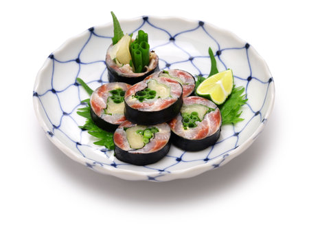Pickled sardines and ginger wrapped in nori seaweed, A Japanese sushi restaurant roll dish.の写真素材