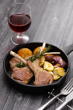 grilled lamb chops and vegetables on skillet, french cuisineの写真素材