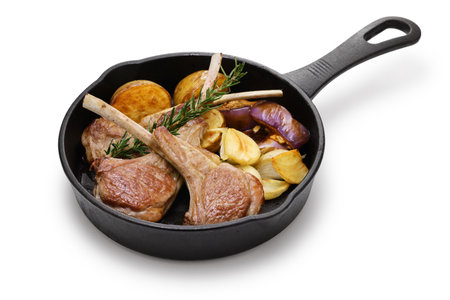 grilled lamb chops and vegetables on skillet, french cuisineの写真素材