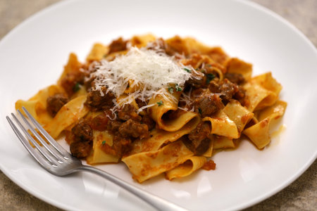 Homemade pappardelle pasta with lamb ragu sauce. Italian cuisine.の写真素材