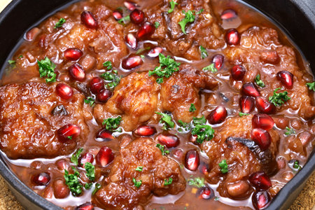 pomegranate chicken in skilletの写真素材