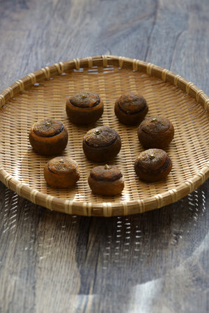 Homemade miso yubeshi is a Japanese preserved food made by removing the flesh from citrus yuzu and filling it with miso paste. handmade process, sun drying.の写真素材