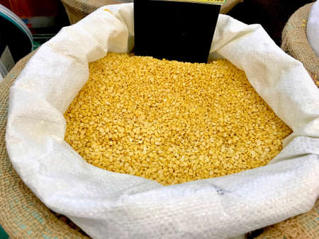 Yellow beans in the white sack