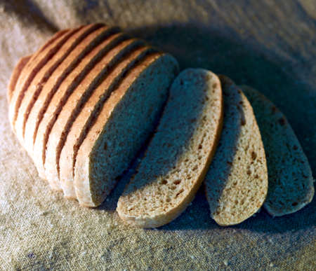 bran wheat bread in the rays of the rising sun