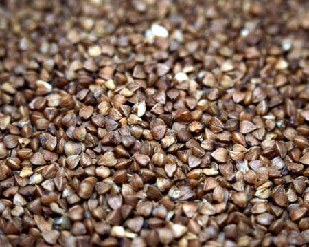 buckwheat crumbled on the table in a thin layerの写真素材