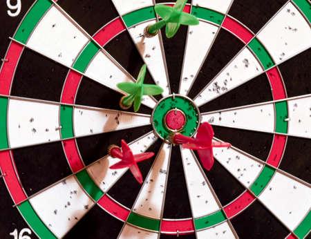 darts target with darts sticking outの写真素材