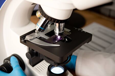 Microscope in medical clinical laboratory close-up
