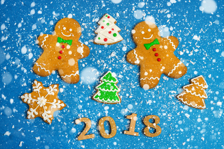 New Year card Inscription Happy new year 2018 on the background of snow and decorの写真素材