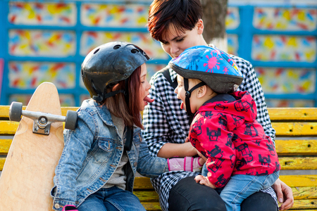 Active young mother with a child on a walk in the parkの写真素材
