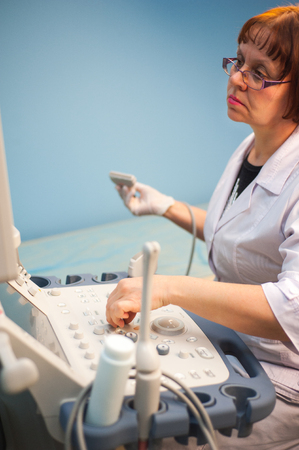 Ultrasound machine doctors hand usg inverstigationの写真素材