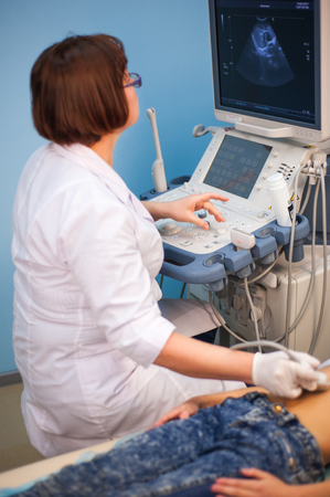 Ultrasound machine doctors hand usg inverstigationの写真素材