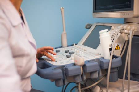 Ultrasound machine doctors hand usg inverstigationの写真素材
