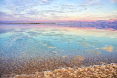 Coast of the Dead Sea, sea water and sunsetの写真素材