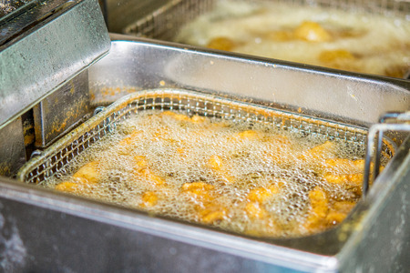 The chef prepares street food. Shrimp, seafood.の写真素材