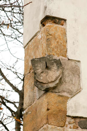 vintage sundial on the wall