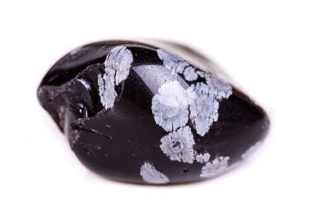 Macro mineral stone snow obsidian on white background close upの写真素材