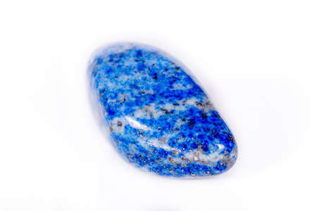 Macro mineral stone blue lapis lazuli (afghanistan) on white background close upの写真素材