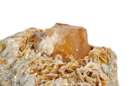 Macro mineral stone Scheelite on a white background close up