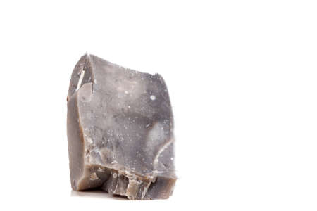 Macro mineral stone Flint in the rock on a white background close upの写真素材