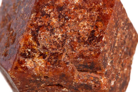 Macro mineral stone Garnet on a white background close up
