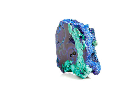 Macro mineral stone malachite with azurite on white background close upの写真素材