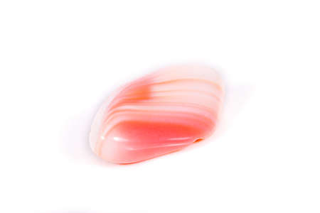 Macro mineral agate of Madagascar against white background close-upの写真素材