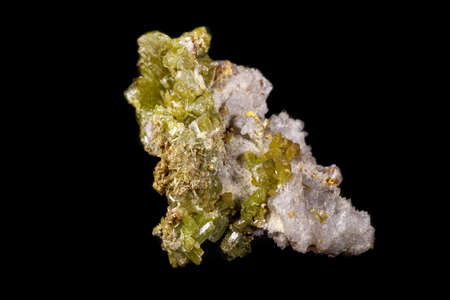 Macro Pyromorphite mineral stone on a black background close up