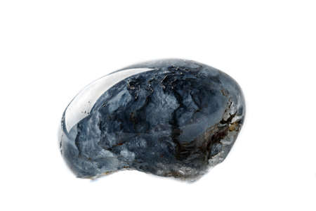 Macro mineral quartz stone with dumortierite on a white background close up