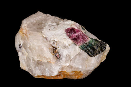 macro mineral tourmaline stone on black background close up