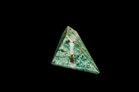 Nephrite mineral stone macro on a black background close up