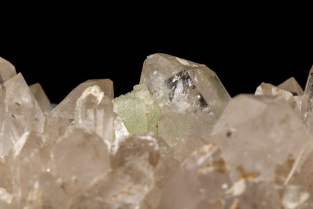 Macro mineral stone Prehnite quartz on a black background close upの写真素材