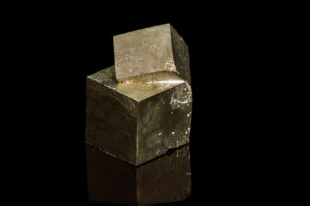 Macro mineral stone Pyrite on a black background close upの写真素材