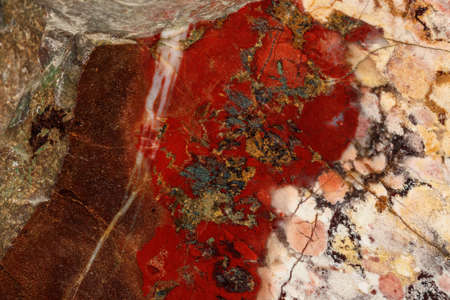 macro stone mineral jasper on black background close up