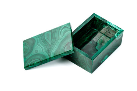 macro malachite boxes on white background close up