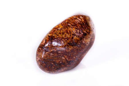 Macro mineral stone Bronze on white background close upの写真素材