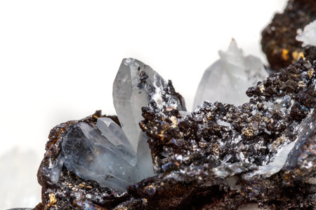 Macro mineral stone Drusus quartz with sphalerite in the rock a white background close upの写真素材