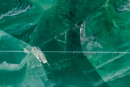 Macro mineral stone Fluorite crystal on a black background close-upの写真素材