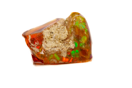 Macro Opal mineral stone in rock on white background close up