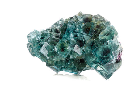 Macro mineral stone Fluorite on a white background close-upの写真素材