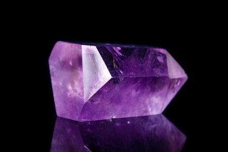 Macro mineral stone Amethyst crystal on a black background close-upの写真素材