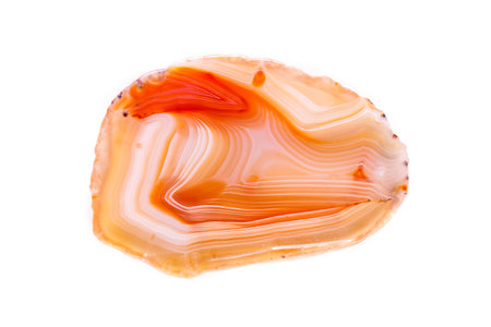 Macro mineral orange agate in crystals on white background close up
