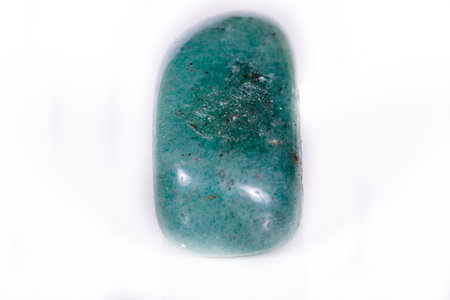 Macro mineral stone aventurine green on white background close up