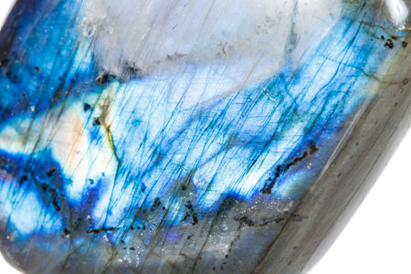 Macro mineral stone Labradorite on white background close up