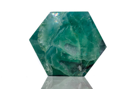 Macro mineral stone Fluorite crystal on a black background close-up