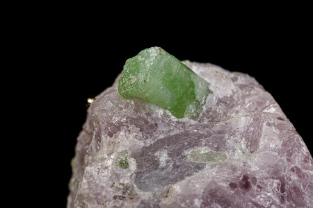 macro mineral stone pargasite on black background close-up
