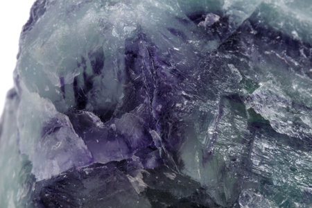 Macro mineral stone Fluorite on white background close up