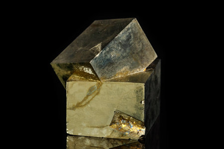 Macro mineral stone Pyrite on a black background close upの写真素材