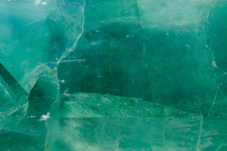 Macro mineral stone Fluorite crystal on a black background close-upの写真素材