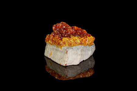 Macro Mineral Stone Orpiment on Black Background Close Upの写真素材